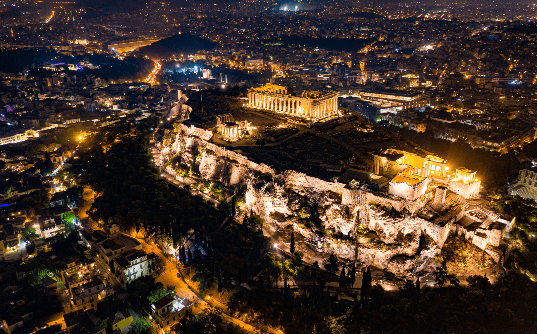 Night aerial view of the illuminated Acropolis in Athens