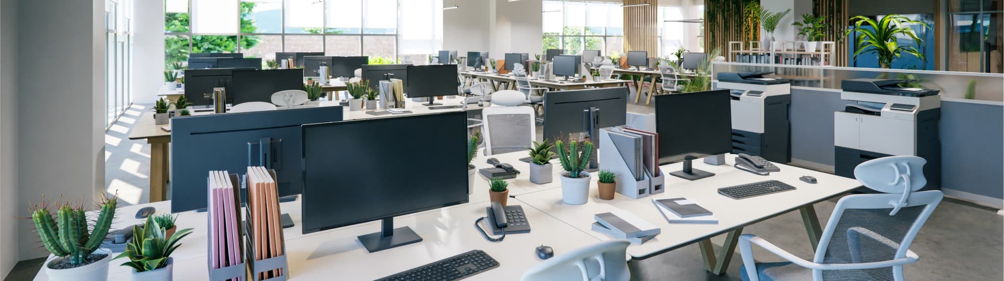 Modern open-plan office with perfectly set up IT workstations after the corporate relocation.