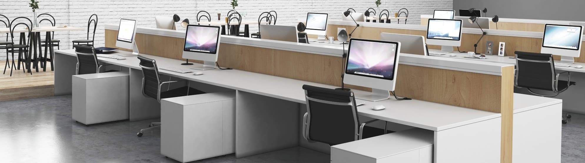Modern open-plan office with fully set-up workstations ahead of a planned internal space reorganization by DACHSER & KOLB.