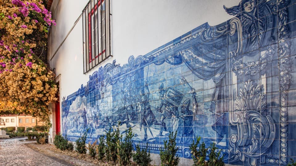 Azulejos on a house wall in Portugal