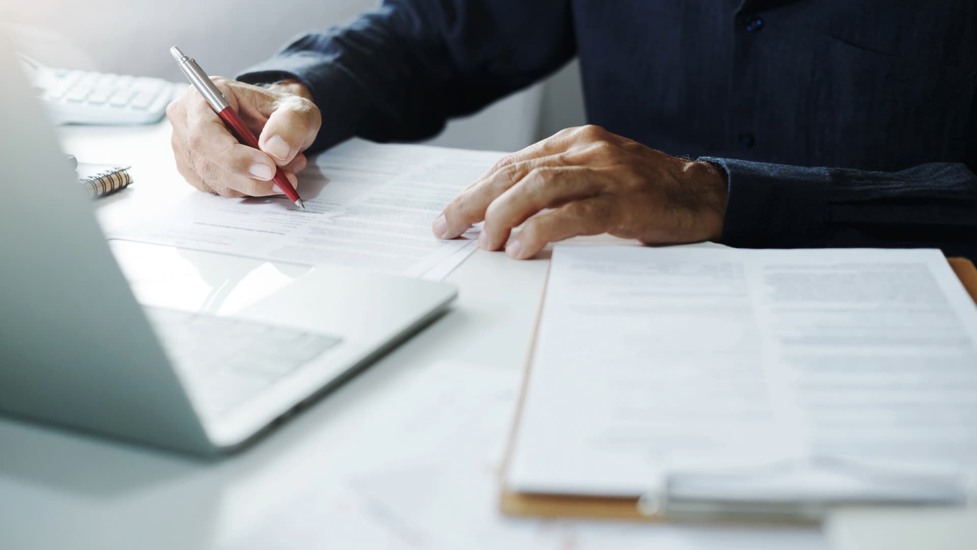 Desk paperwork – records for driving and rest times (lenkzeiten und ruhezeiten) being reviewed and signed