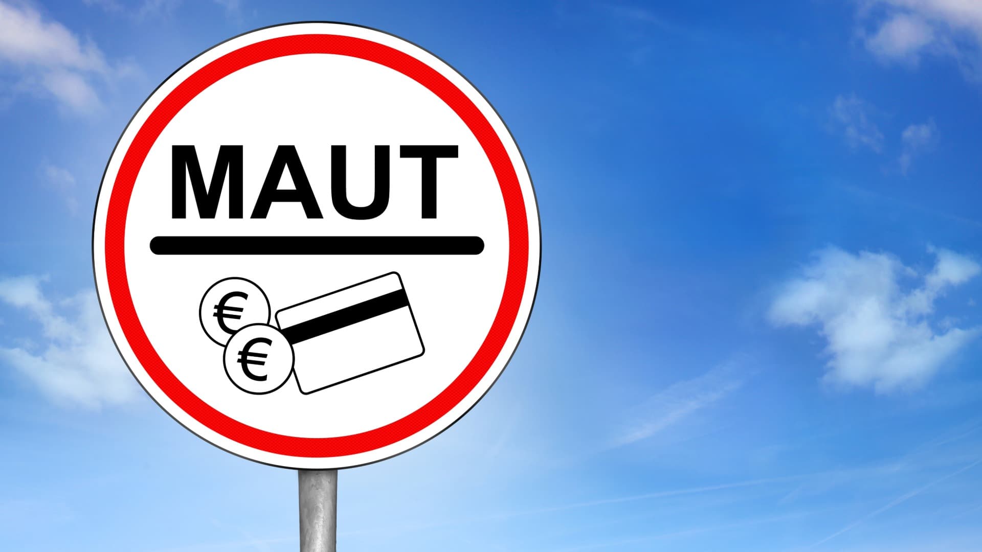 “MAUT” road sign with coins and card against blue sky – indicating toll fees