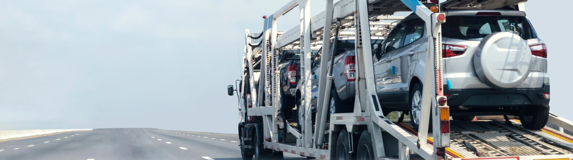 car carrier transports multiple vehicles – safe vehicle transport on the road