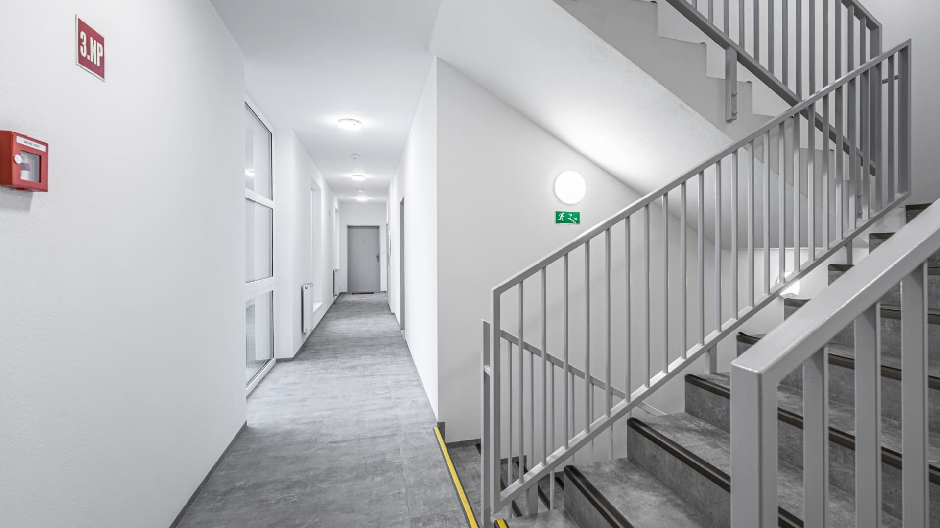 Wide staircase and corridor in a modern building – typical access route for moves using a stair climber