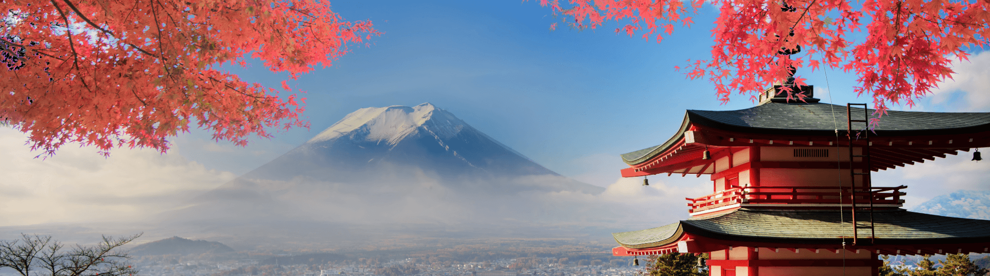 Pagoda with red autumn leaves in front of Mount Fuji, Japan