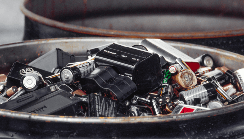 Container with old batteries – proper disposal and recycling of hazardous waste during a move
