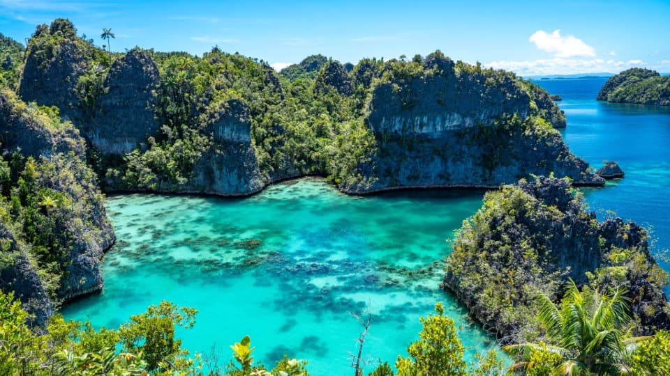 The turquoise-blue sea between various islands in Indonesia