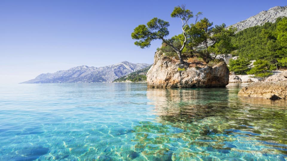 The famous Brela Stone on the Makarska Riviera, symbolizing Croatia's unique blend of the Adriatic Sea and nature.