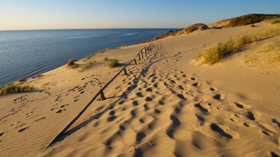 The shifting sand dunes of the Curonian Spit on Lithuania’s Baltic coast – a UNESCO World Heritage Site and a symbol of Lithuania’s tranquility and natural beauty.
