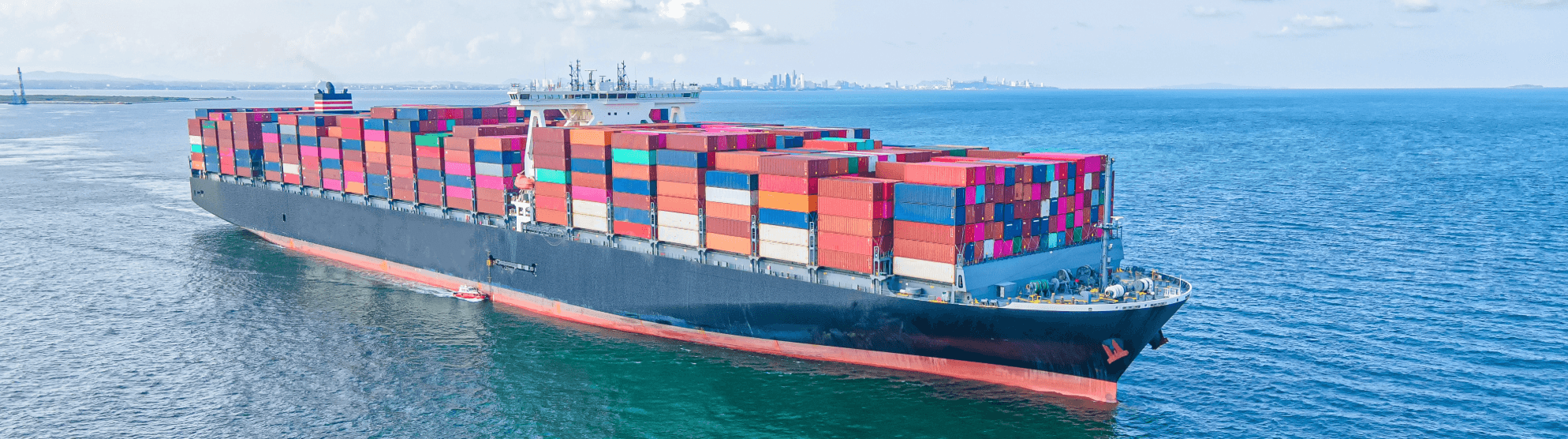 Container ship at sea with colorful containers, precise Estimated Time of Departure (ETD) planning for seamless logistics.
