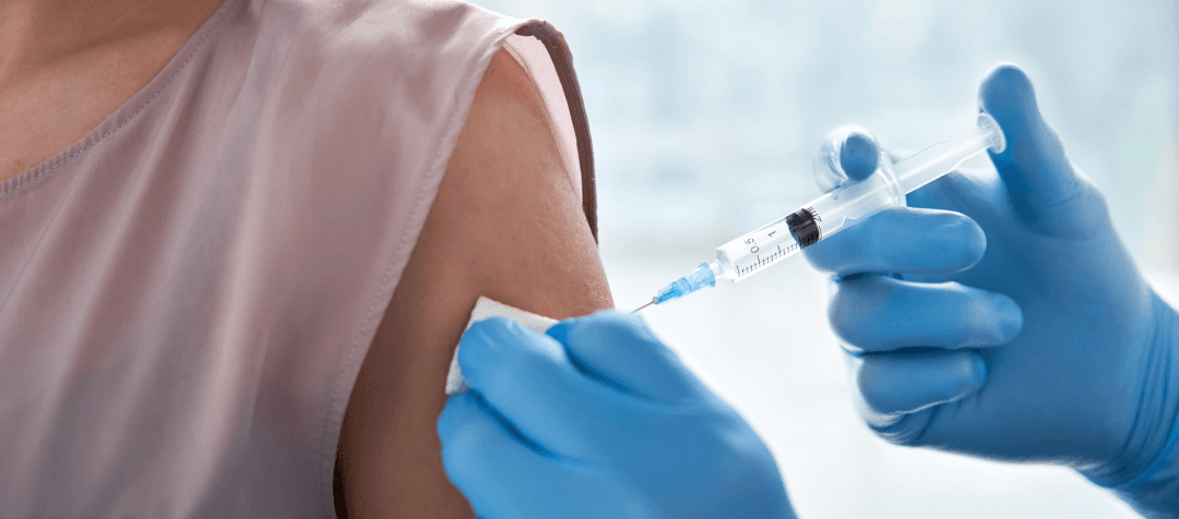 Upper arm of a person receiving an injection