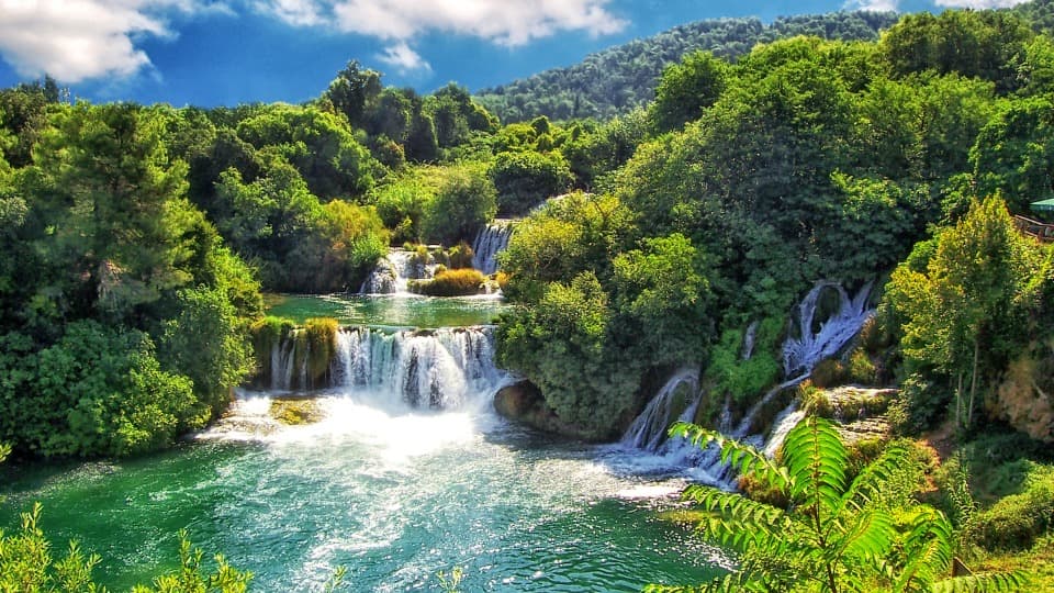The Krka National Park waterfalls showcasing the Mediterranean climate and lush nature in Croatia's coastal region.